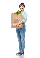 Image showing happy smiling asian woman with food in paper bag