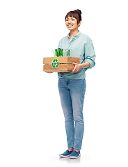 Image showing smiling young asian woman sorting glass waste