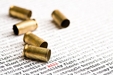 Image showing bullet shells over violence