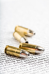 Image showing bullets over violence
