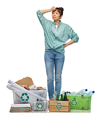 Image showing tired woman sorting paper, metal and plastic waste