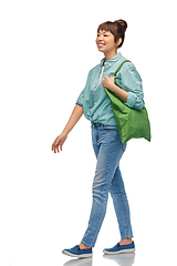 Image showing woman with reusable canvas bag for food shopping