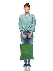 Image showing woman with reusable canvas bag for food shopping