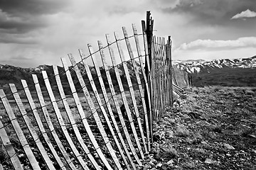 Image showing old fence through mountains