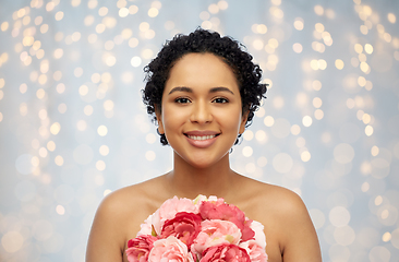 Image showing portrait of african american woman with flowers