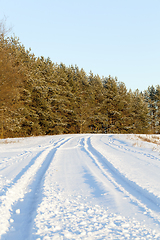 Image showing Track on a snow-covered road