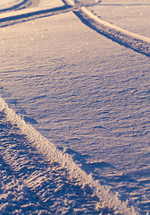 Image showing Track on a snow-covered road