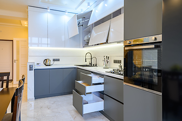 Image showing Luxury white and dark grey modern kitchen interior
