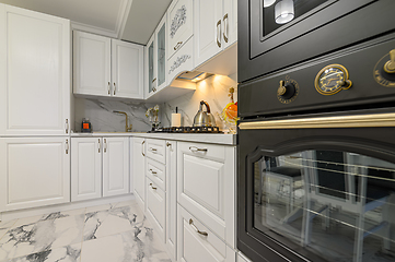 Image showing White kitchen in classic style, front view