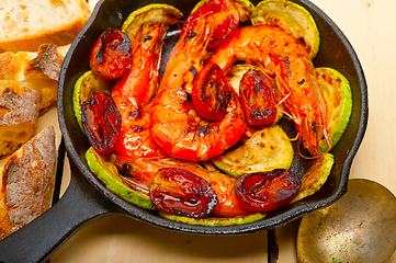 Image showing roasted shrimps with zucchini and tomatoes