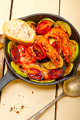 Image showing roasted shrimps with zucchini and tomatoes