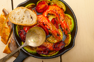 Image showing roasted shrimps with zucchini and tomatoes