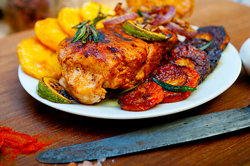 Image showing roasted grilled BBQ chicken breast with herbs and spices