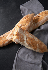 Image showing close up of baguette bread on kitchen towel