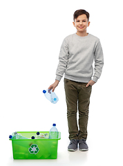 Image showing smiling boy sorting plastic waste