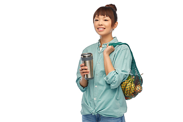 Image showing woman with thermo cup or tumbler for hot drinks