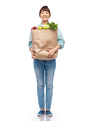 Image showing happy smiling asian woman with food in paper bag