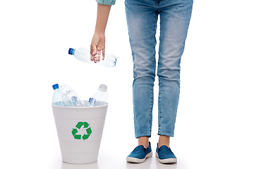 Image showing close up of young woman sorting plastic waste