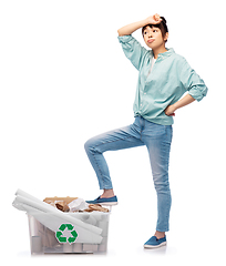 Image showing tired asian woman sorting paper waste