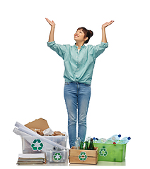 Image showing happy woman sorting paper, metal and plastic waste