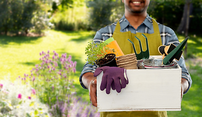 Image showing indian gardener or farmer with box of garden tools