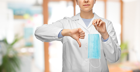 Image showing female doctor with mask showing thumbs down