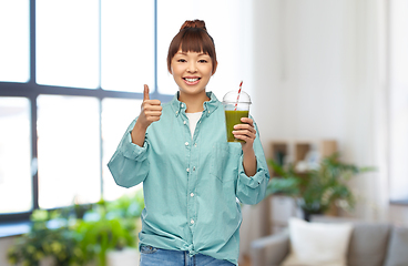 Image showing happy smiling asian woman with can drink