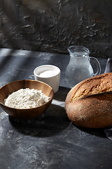 Image showing bread, wheat flour, salt and water in glass jug