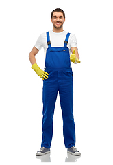 Image showing happy male worker or cleaner in overall and gloves