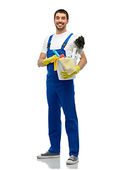 Image showing male cleaner in overall with cleaning supplies