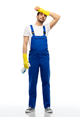 Image showing male cleaner cleaning with sponge and detergent