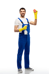 Image showing male cleaner cleaning with sponge and detergent