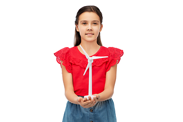 Image showing smiling girl with toy wind turbine