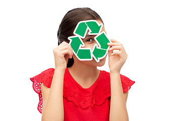 Image showing smiling girl holding green recycling sign