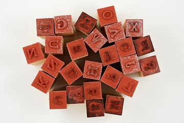 Image showing rubber stamps of letters of the Latin alphabet in disarray 