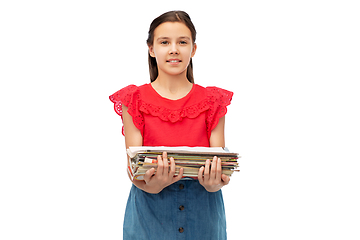 Image showing smiling girl with magazines sorting paper waste