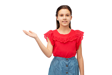 Image showing happy smiling girl holding something on her hand