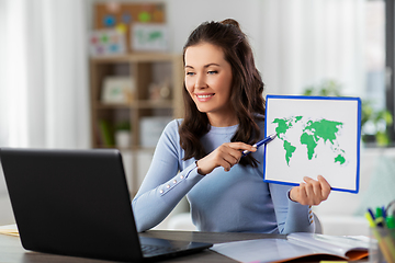 Image showing teacher with world map having online class at home