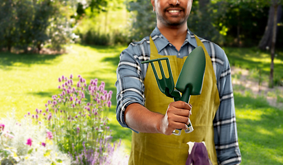 Image showing indian gardener or farmer with garden tools