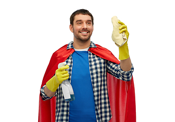 Image showing smiling man in superhero cape with rag and cleaner