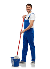 Image showing male cleaner cleaning floor with mop and bucket