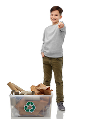 Image showing smiling boy sorting paper waste