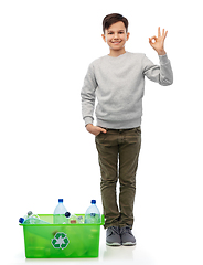 Image showing smiling boy sorting plastic waste