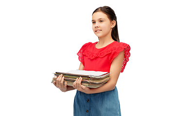 Image showing smiling girl with magazines sorting paper waste