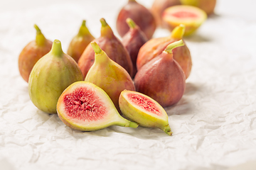 Image showing Tasty organic figs on white background