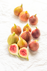 Image showing Tasty organic figs on white background