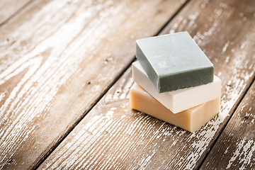 Image showing Natural soap bars on wooden background