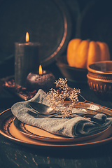 Image showing Restaurant autumn table setting. Thanksgiving holiday Place setting autumn decoration.