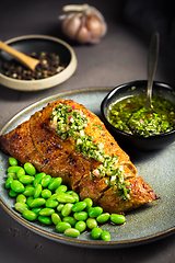 Image showing Grilled pork steak with edamame beans and Chimichurri sauce