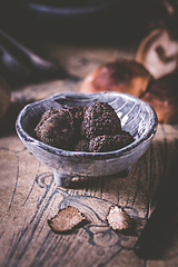 Image showing Truffles and shiitake mushrooms and spices on kitchen table